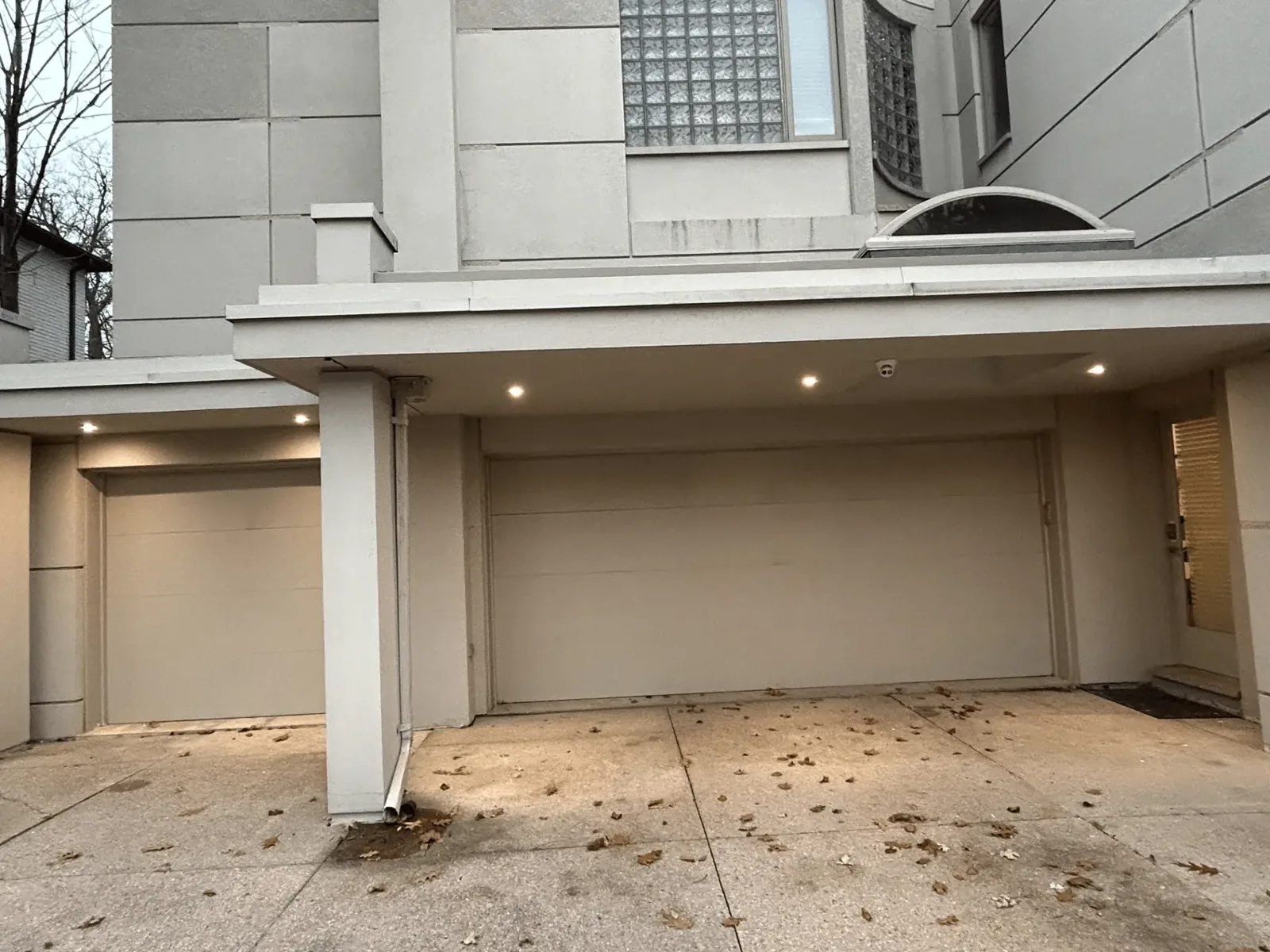 New recessed lighting installed above the garage entrances